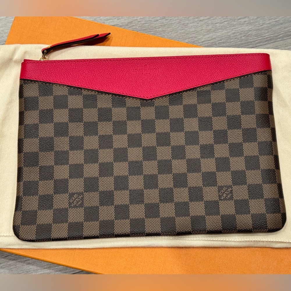 Brand New Louis Vuitton Daily Pouch in rare Damier Ebene canvas